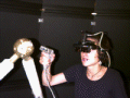 User with head-worn display scanning barcode on a spaceframe strut